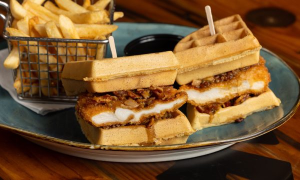 Chicken and Waffle Sandwich with fries